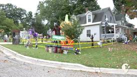 The ‘Halloween House’ in Cadillac is using their decorations to help the community