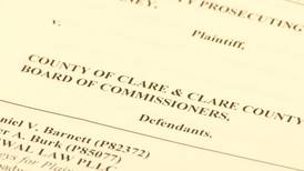 Clare County prosecutor sues county commission