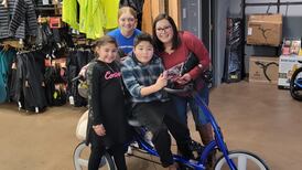 Young girl raises $4,000 for special needs bike by collecting cans