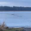 DNR Officer Risks Hypothermia to Save Man Who Fell Through the Ice
