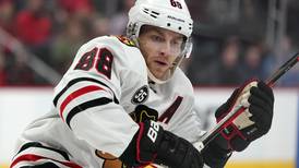 Patrick Kane is signing with the Detroit Red Wings, an AP source says 