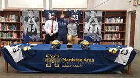 Manistee Duo Commits to Olivet College