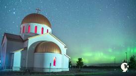 Archangel Gabriel Orthodox Church offering its flower garden to view the Northern Lights