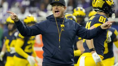 Michigan head football coach Jim Harbaugh faces 4-game suspension for recruiting violations, sources say