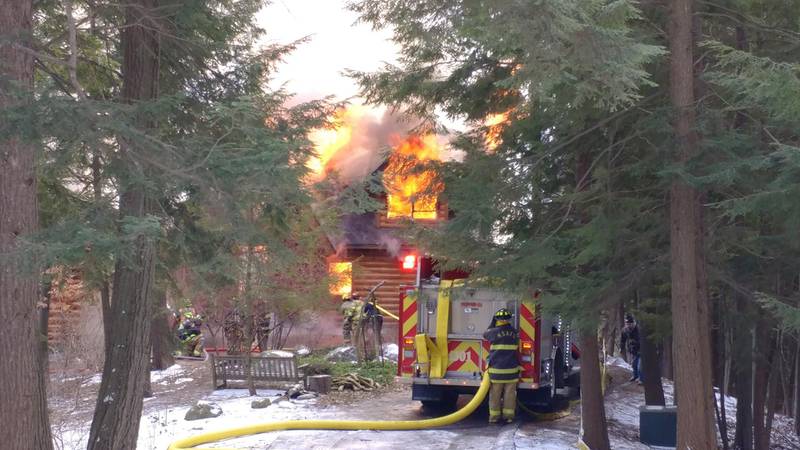 Promo Image: Developing: Crews Battle Harbor Springs House Fire