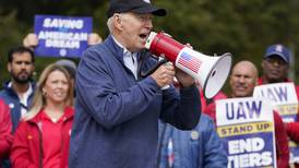 Biden urges striking autoworkers to ‘stick with it’ as he visits Michigan picket line 
